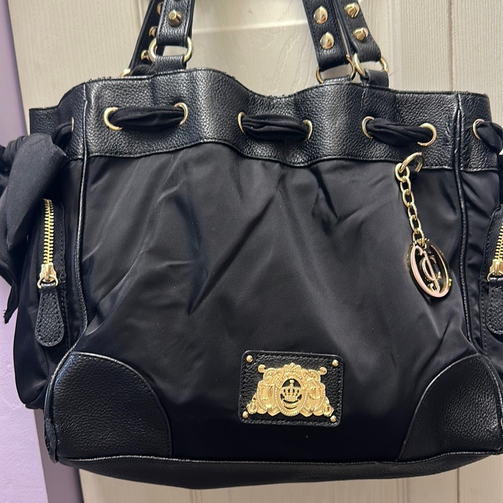 SOLD***SOLD***This is a black Juicy couture bag more from the year 2013